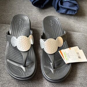 CROCS Gray Thong Sandals with Silver Medallions